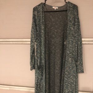 Lularoe “Sarah” calf length sweater with pockets.